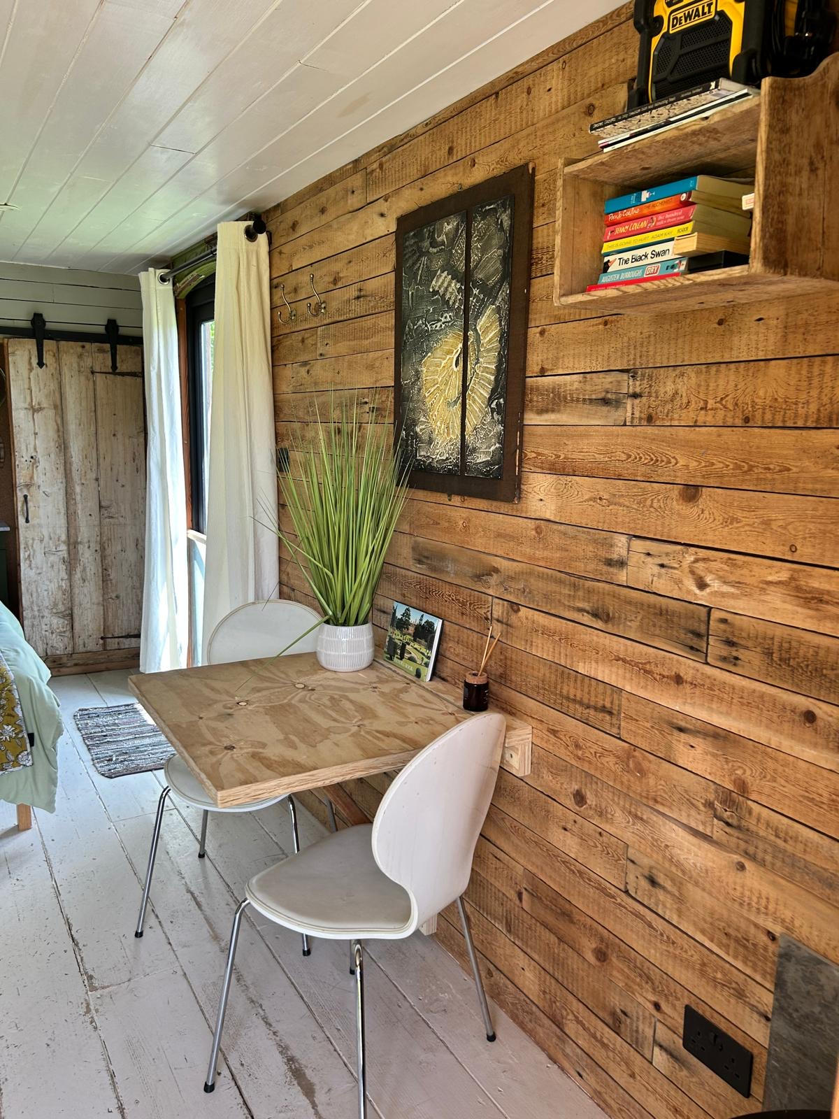 Kalou cabin reading and writing nook, reclaimed timber interior