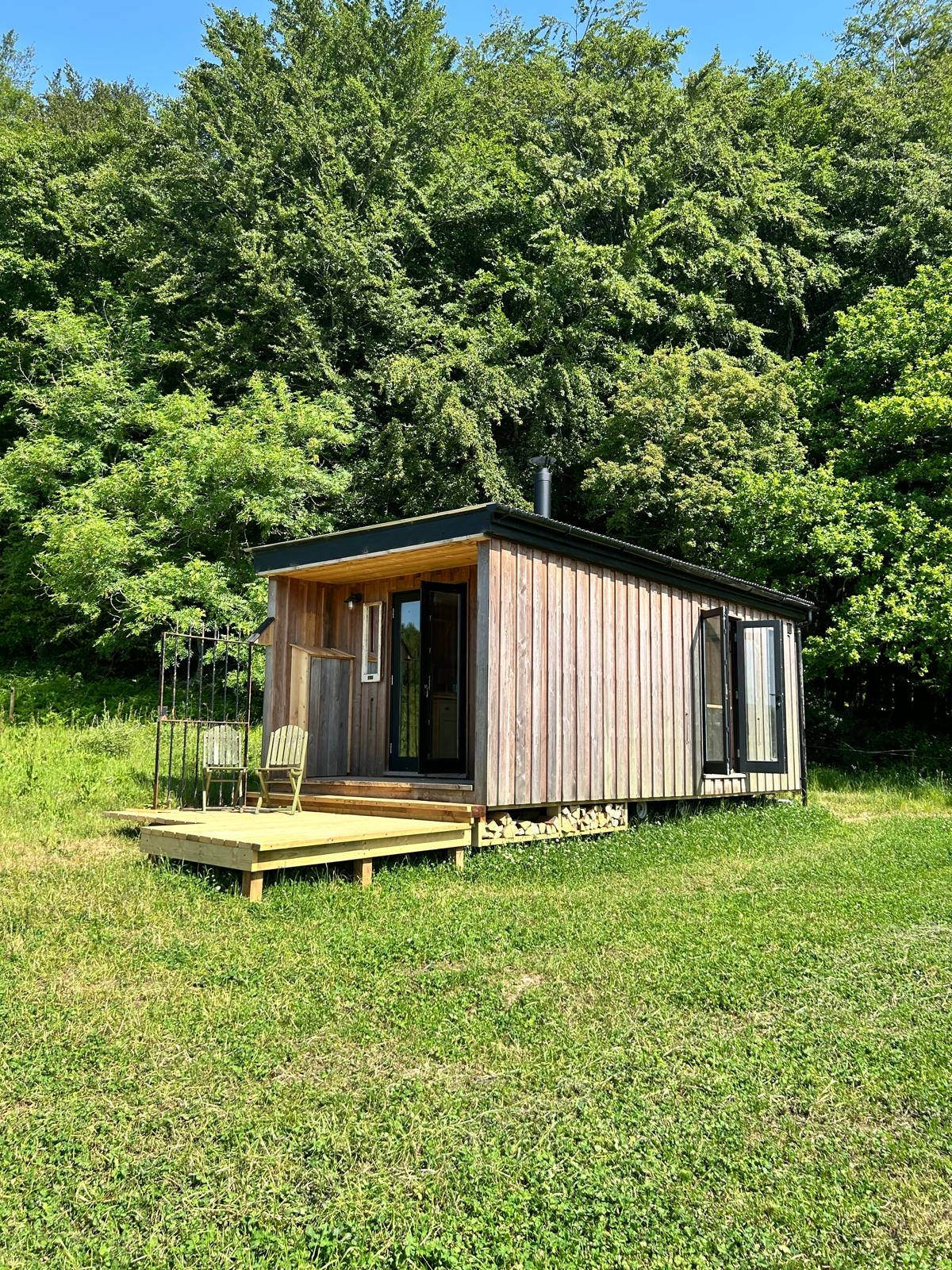Kalou cabin exterior — design-led off-grid stay in East Dean, Goodwood, West Sussex